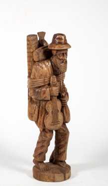 Swiss/ German Wooden Sculpture of a Traveling Musician