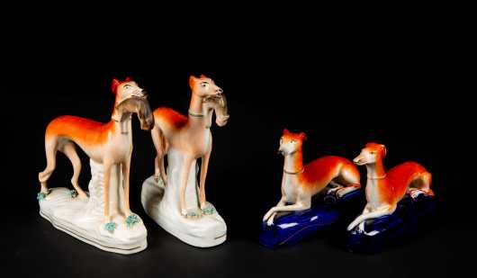 Four Staffordshire Whippet Figurines