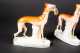 Four Staffordshire Whippet Figurines