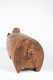 A Massim/Trobriand Islands Carved Pig with Figure