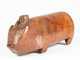 A Massim/Trobriand Islands Carved Pig with Figure