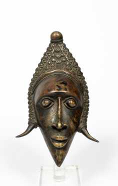 A West African Cast Bronze Mask