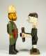 A West African Colonial Figure, Soldier and a Folk Art Painted Photographer Figure