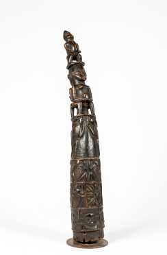 An African Carved Figural Assemblage in the Form of an Oliphant