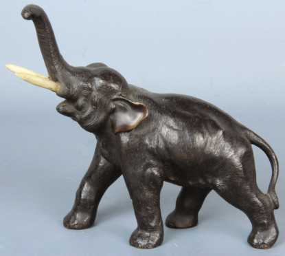 Small Japanese Bronze of an Elephant with a raised trunk 