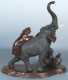 Japanese Bronze Elephant with ivory tusks being attacked by 2 tigers