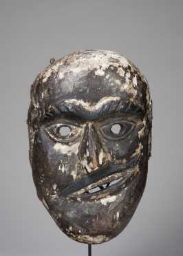 A Shamanic mask with twisted mouth