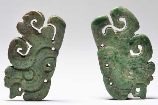 A Superb pair of Mayan Jade plaques representing the jester-god.